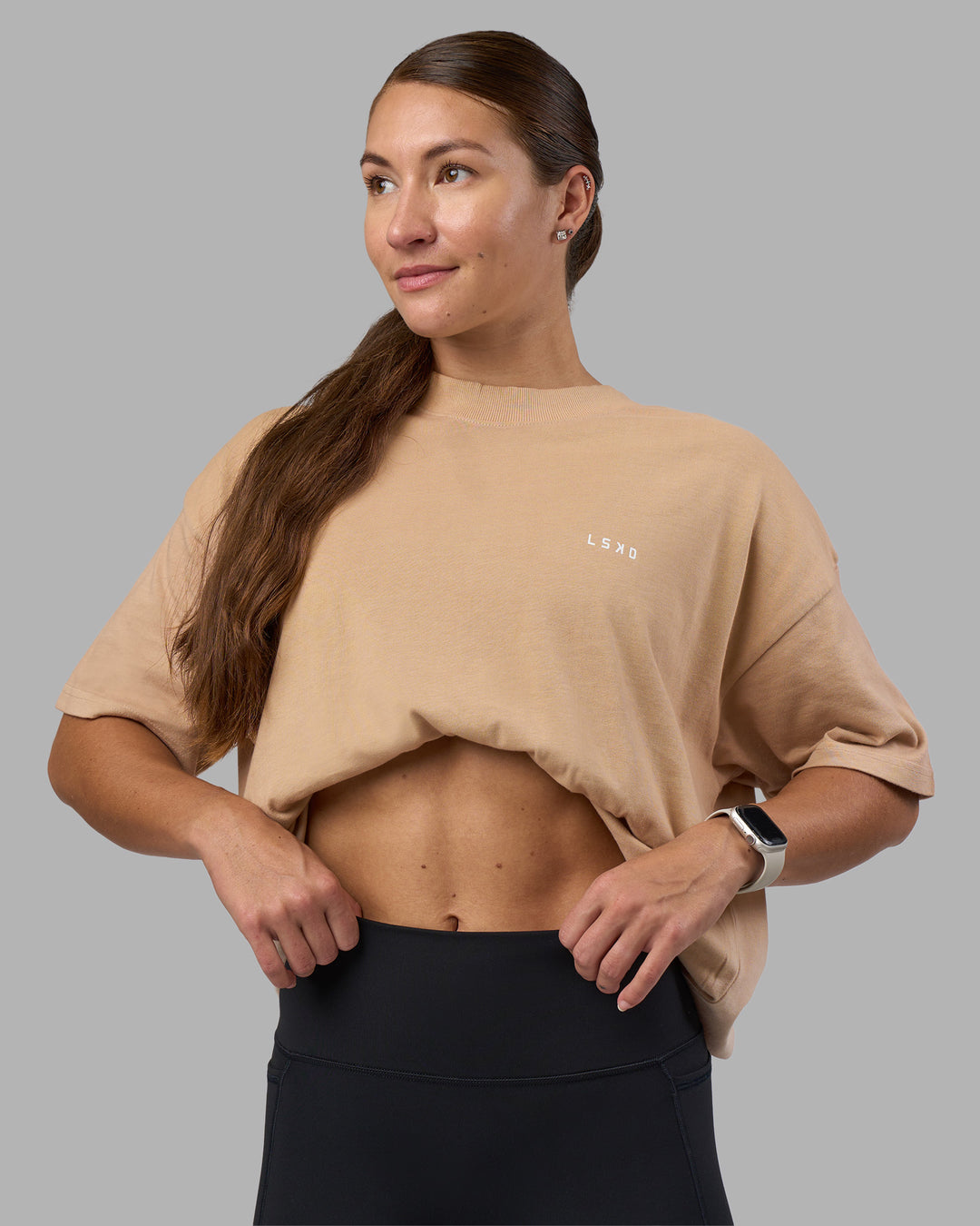 Woman wearing Faded Heavyweight Oversized Tee - Warm Smoke-White | Model:Hannah | Size:XS
