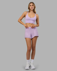 Woman wearing Flash Longline Sports Bra - Pale Lilac | Model:Leilani | Size:XS