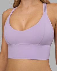 Woman wearing Flash Longline Sports Bra - Pale Lilac | Model:Leilani | Size:XS