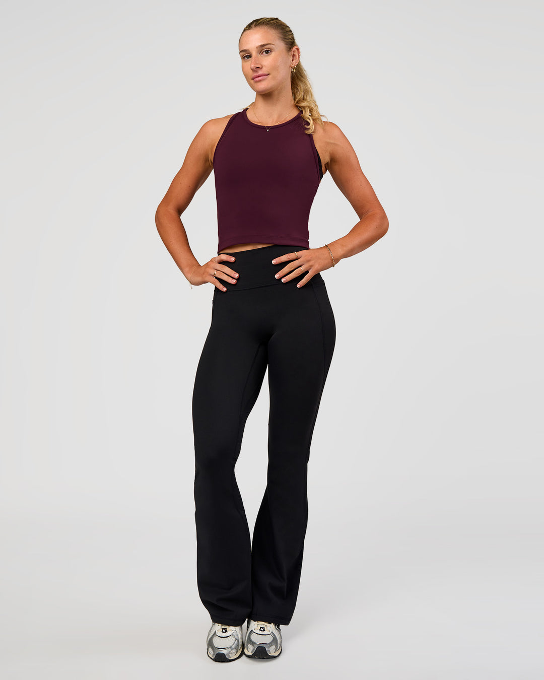 Woman wearing Flow Performance Tank 2.0 - Cherry Lacquer | Model:Emelia | Size:XS