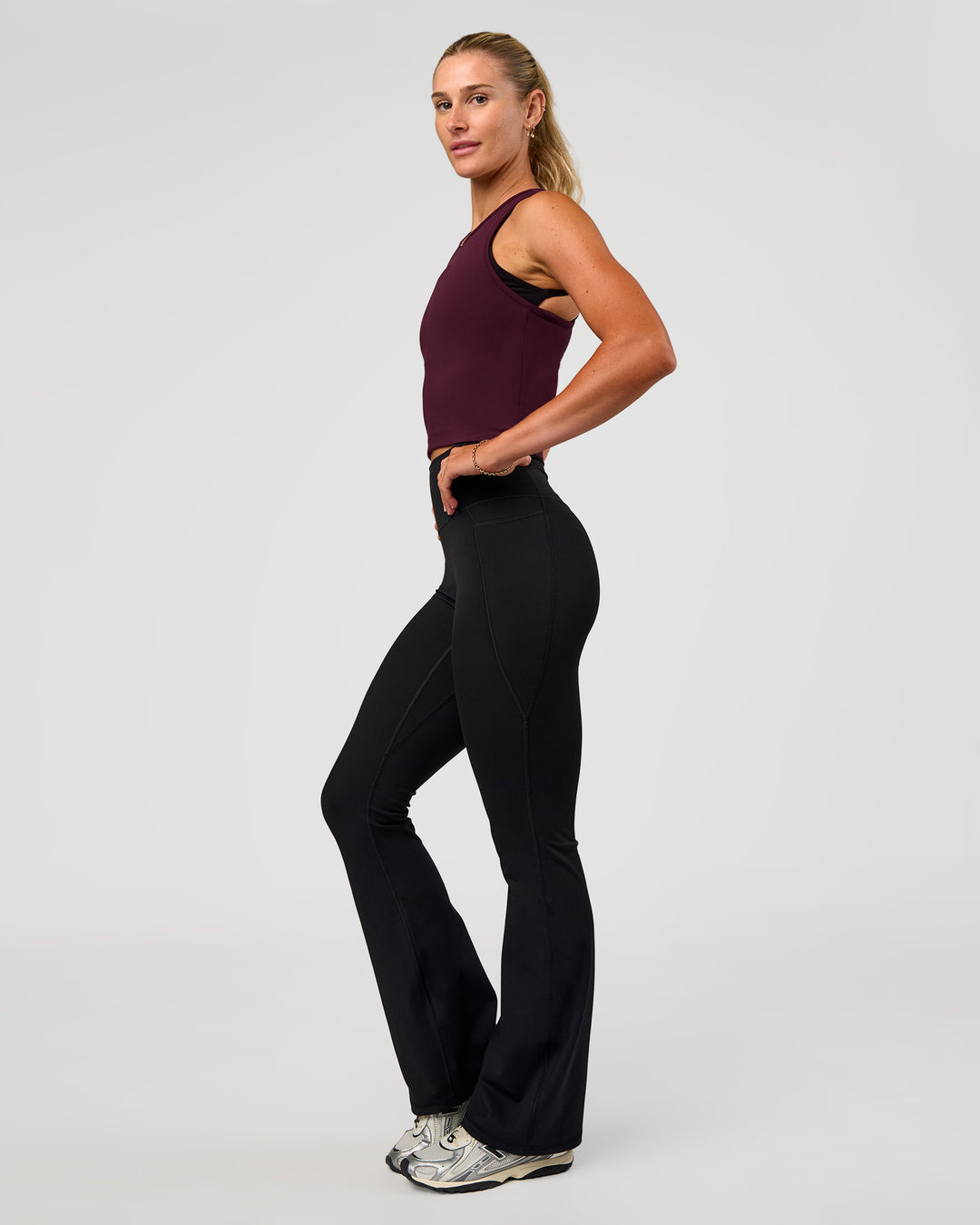 Woman wearing Flow Performance Tank 2.0 - Cherry Lacquer | Model:Emelia | Size:XS