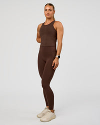 Woman wearing Flow Performance Tank 2.0 - Hot Chocolate | Model:Maja | Size:XS