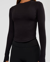 Woman wearing Flow Rib Long Sleeve Tee - Black | Model:Brylee | Size:XS