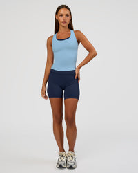 Woman wearing Flow Rib Scoop Neck Tank - Open Air | Model:Brylee | Size:XS