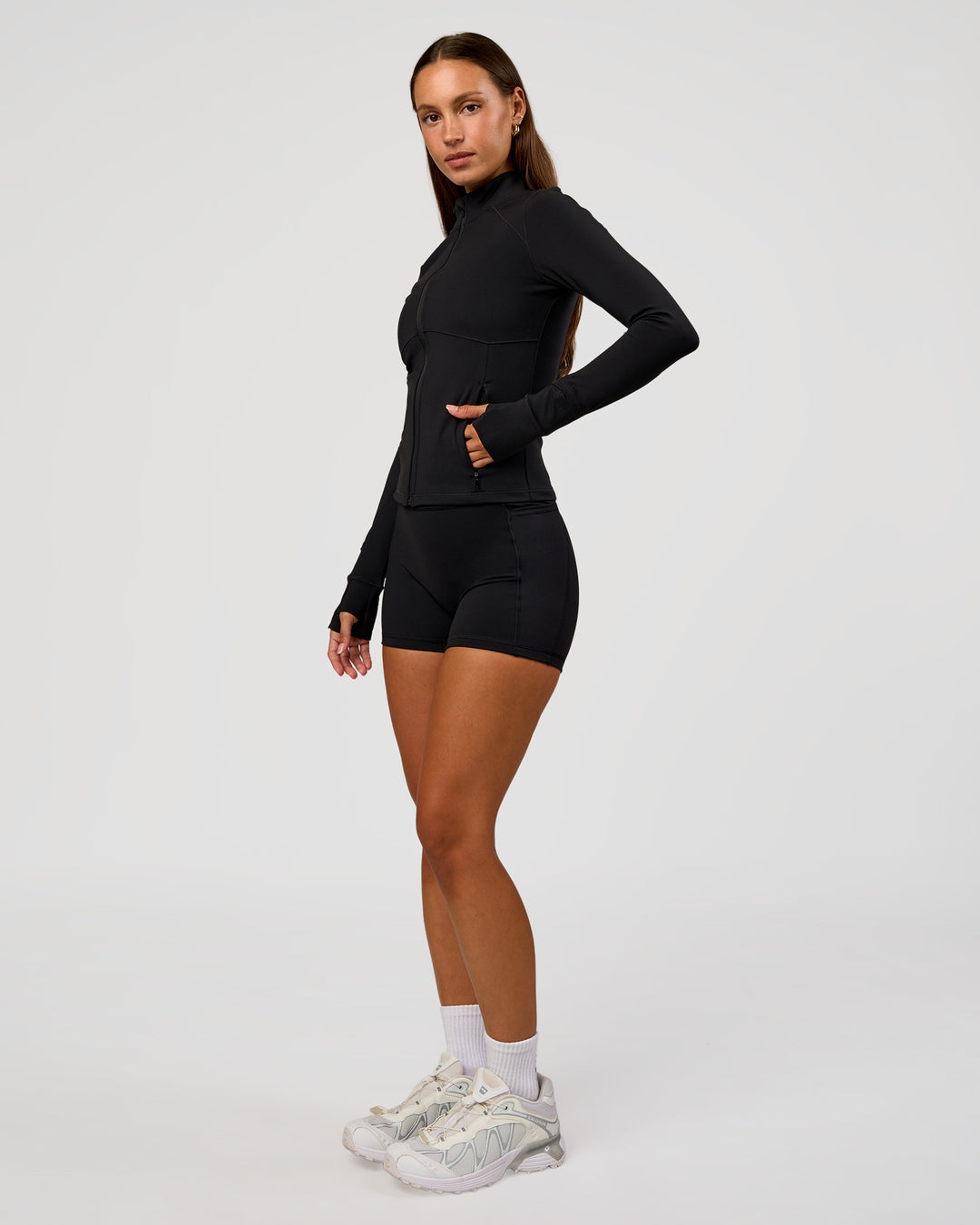 Woman wearing Fusion Active Jacket - Black | Model:Brylee | Size:XS