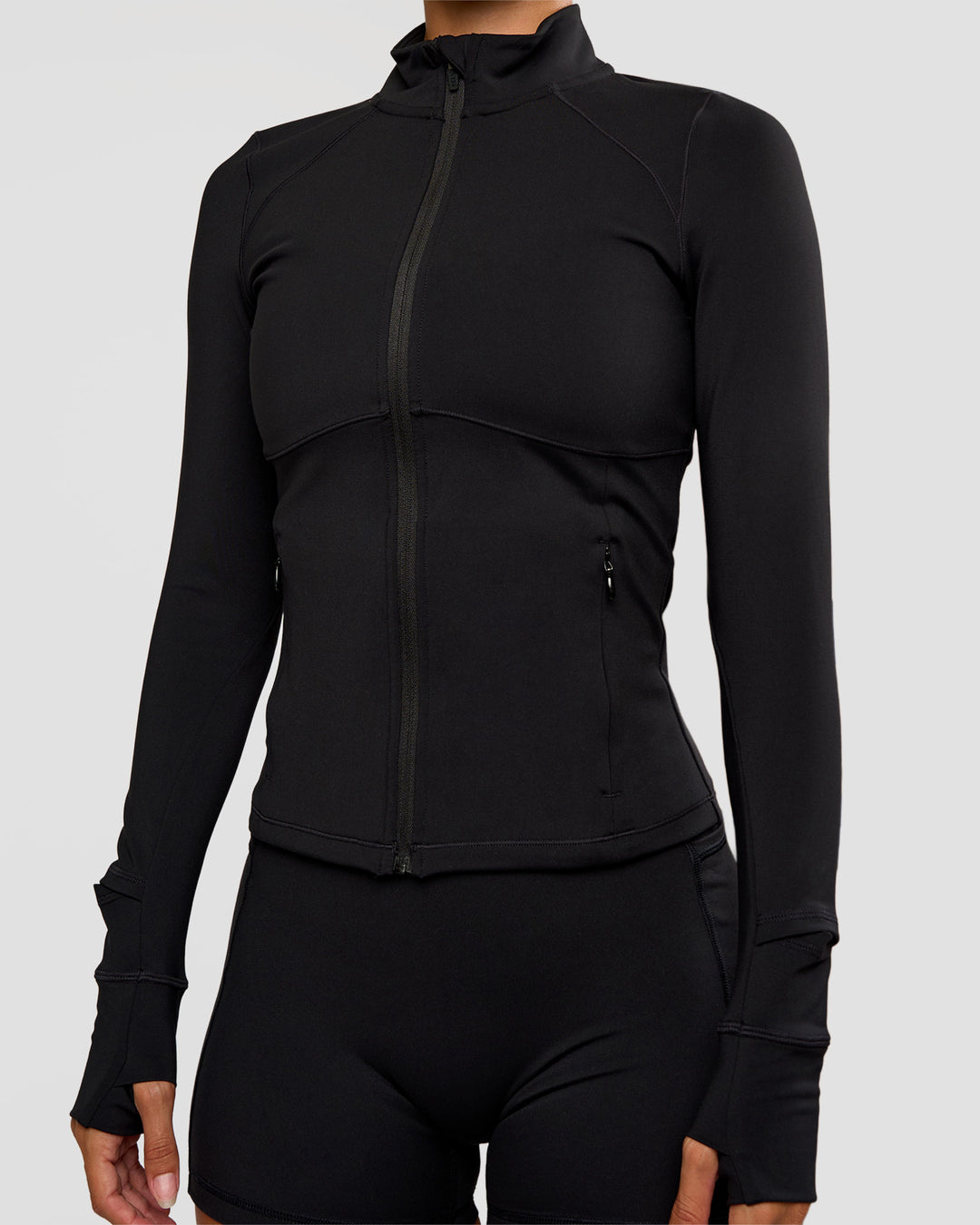 Woman wearing Fusion Active Jacket - Black | Model:Brylee | Size:XS