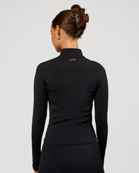 Woman wearing Fusion Active Jacket - Black | Model:Brylee | Size:XS