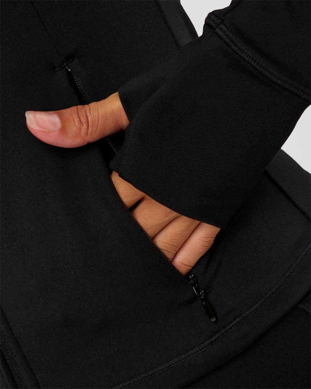 Woman wearing Fusion Active Jacket - Black | Model:Brylee | Size:XS