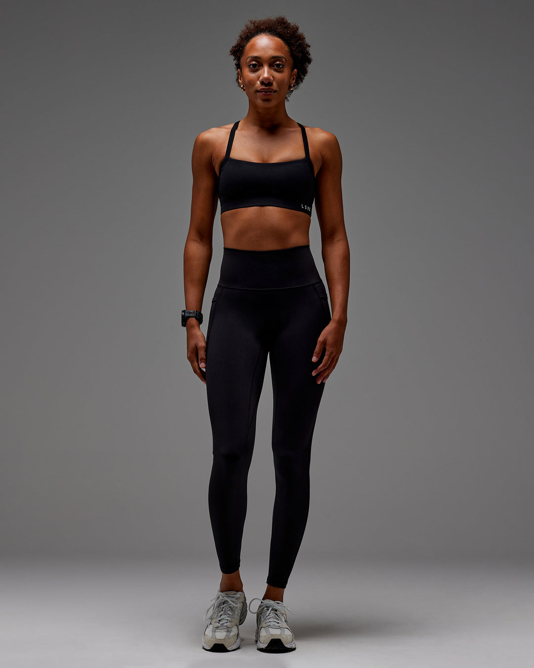 Woman wearing Fusion Ultra High-Rise Full Length Legging Pockets - Black | Model: Txai | Size:XS