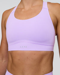 Woman wearing Fusion Sports Bra 2.0 - Pale Lilac | Model:Emelia | Size:XS