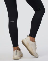 Woman wearing Fusion Ultra High-Rise Full Length Legging - Black | Model:Eliza | Size:XS