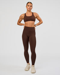 Woman wearing Fusion Ultra High-Rise Full Length Legging Pockets - Hot Chocolate | Model:Maja | Size:XS
