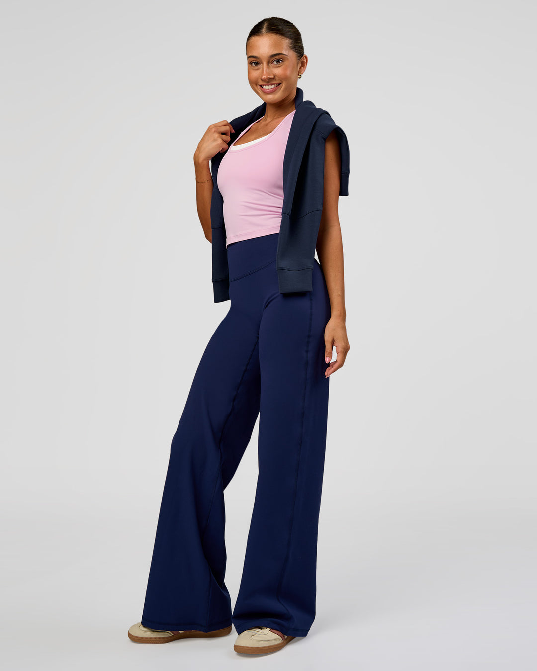 Woman wearing Fusion V-Contour High-Rise Pant - Future Navy | Model:Charli | Size:XS