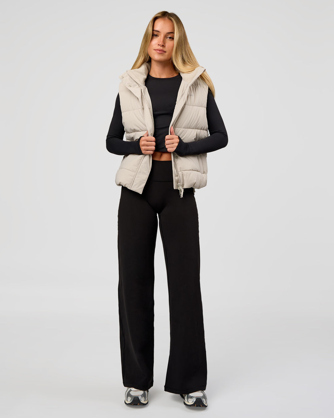 Woman wearing Fusion V-Contour High-Rise Petite Pant - Black | Model:Issy | Size:XS