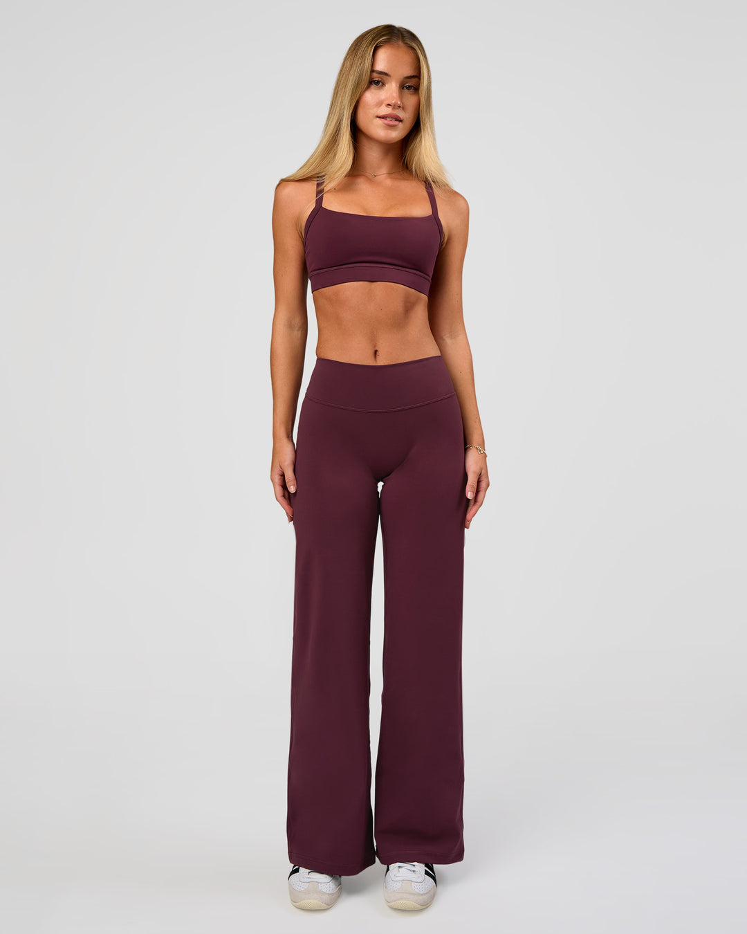 Woman wearing Fusion V-Contour High-Rise Petite Pant - Cherry Lacquer | Model:Issy | Size:XS