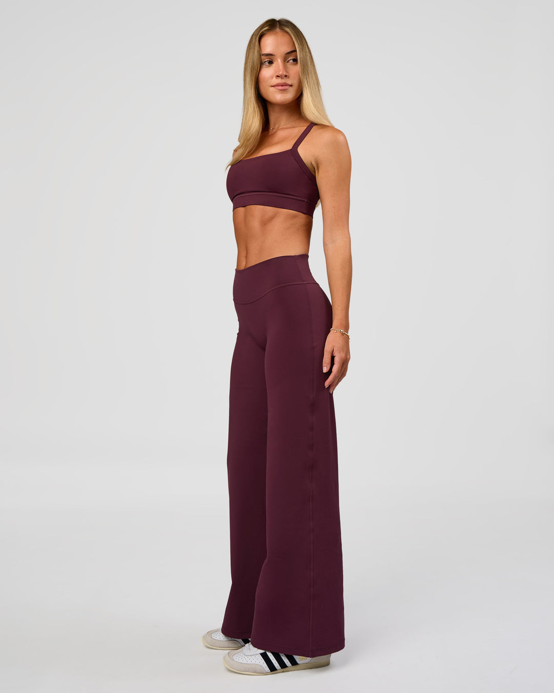 Woman wearing Fusion V-Contour High-Rise Petite Pant - Cherry Lacquer | Model:Issy | Size:XS