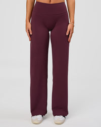 Woman wearing Fusion V-Contour High-Rise Petite Pant - Cherry Lacquer | Model:Issy | Size:XS