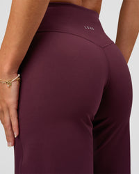 Woman wearing Fusion V-Contour High-Rise Petite Pant - Cherry Lacquer | Model:Issy | Size:XS