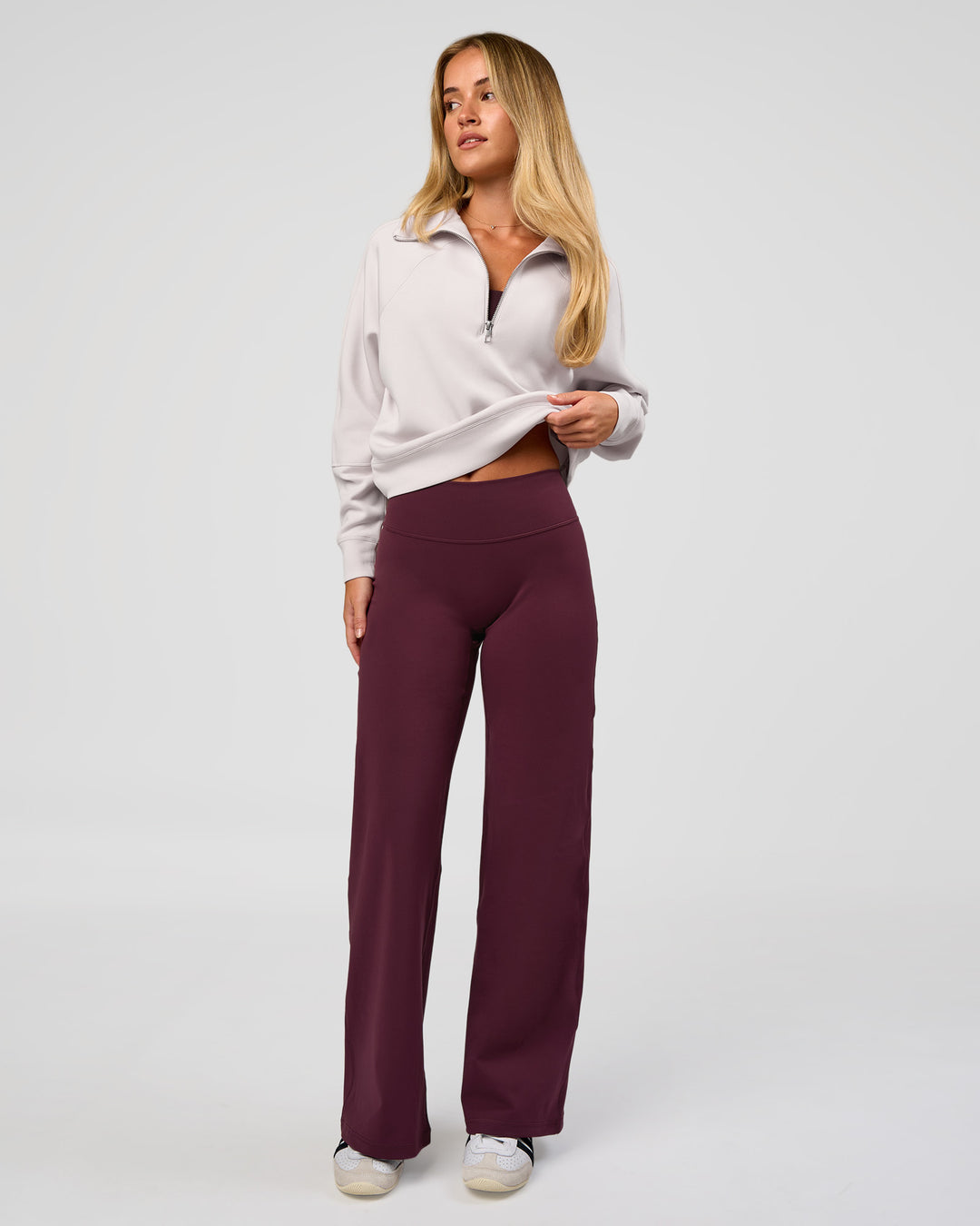 Woman wearing Fusion V-Contour High-Rise Petite Pant - Cherry Lacquer | Model:Issy | Size:XS