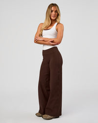 Model wearing Fusion V-Contour High-Rise Petite Pant - Hot Chocolate | Model:Issy | Size:XS