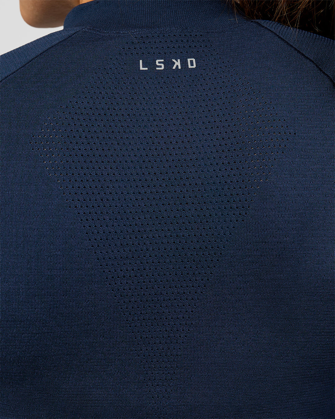 Woman wearing GG AeroFLX+ Long Sleeve Half Zip - Future Navy-Baltic Sea | Model:Grace | Size:XS