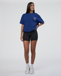 Woman wearing GTC Heavyweight Oversized Tee - Washed Midnight Blue-Marsh | Model:Rhiley | Size:XS