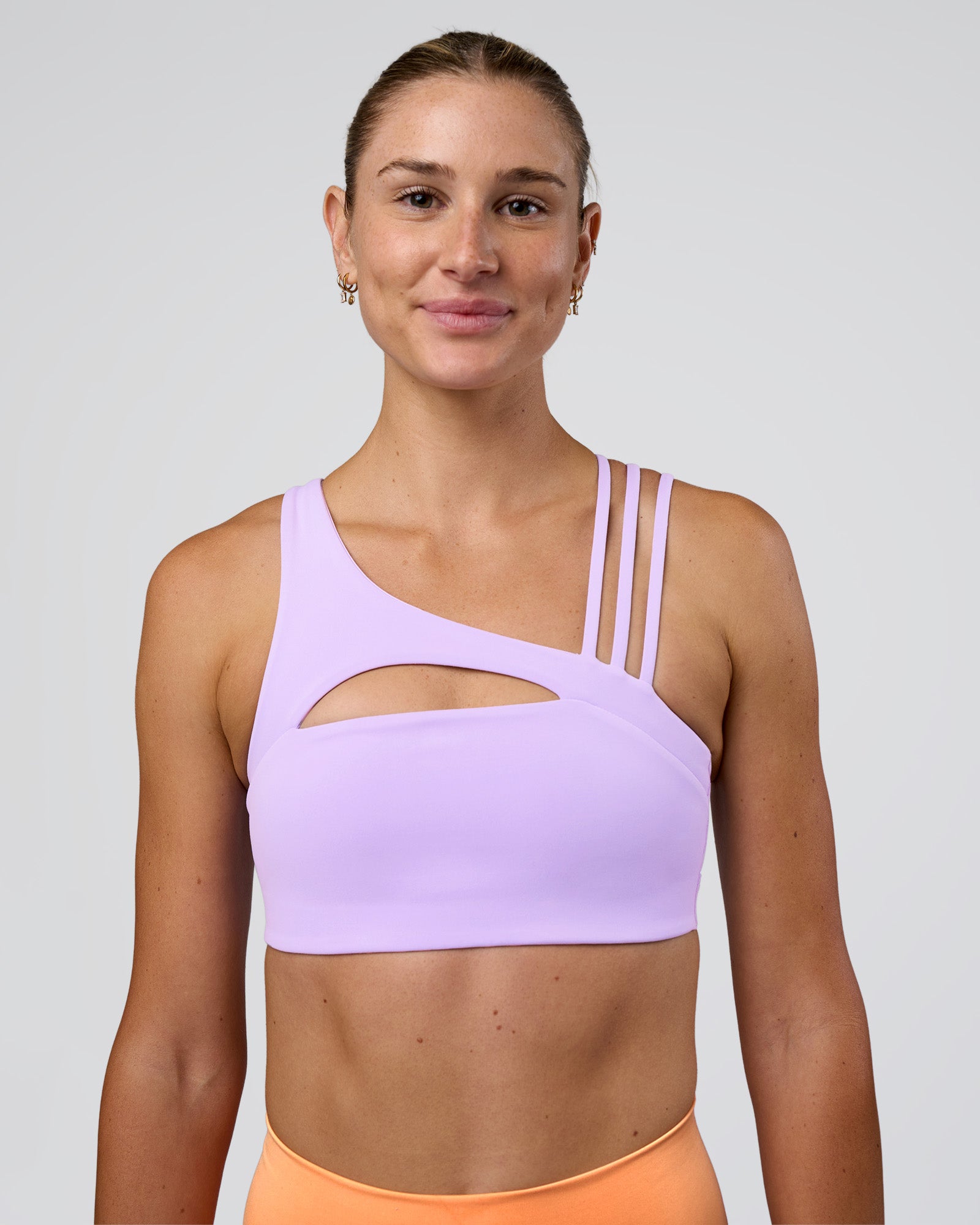 Woman wearing Galvanise Splice Sports Bra - Pale Lilac | Model:Emelia | Size:XS