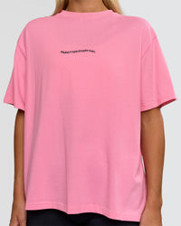 Woman wearing Go-To 1% Better Every Day FLXCotton Oversized Tee - Candy Pink-Black | Model:Amity | Size:XS