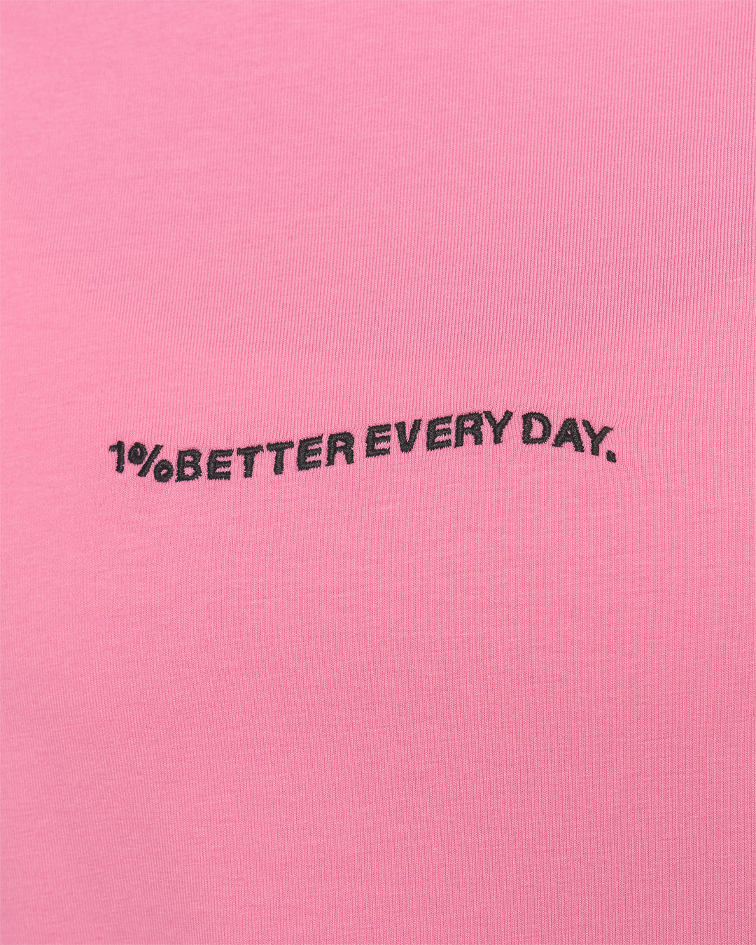Woman wearing Go-To 1% Better Every Day FLXCotton Oversized Tee - Candy Pink-Black | Model:Amity | Size:XS