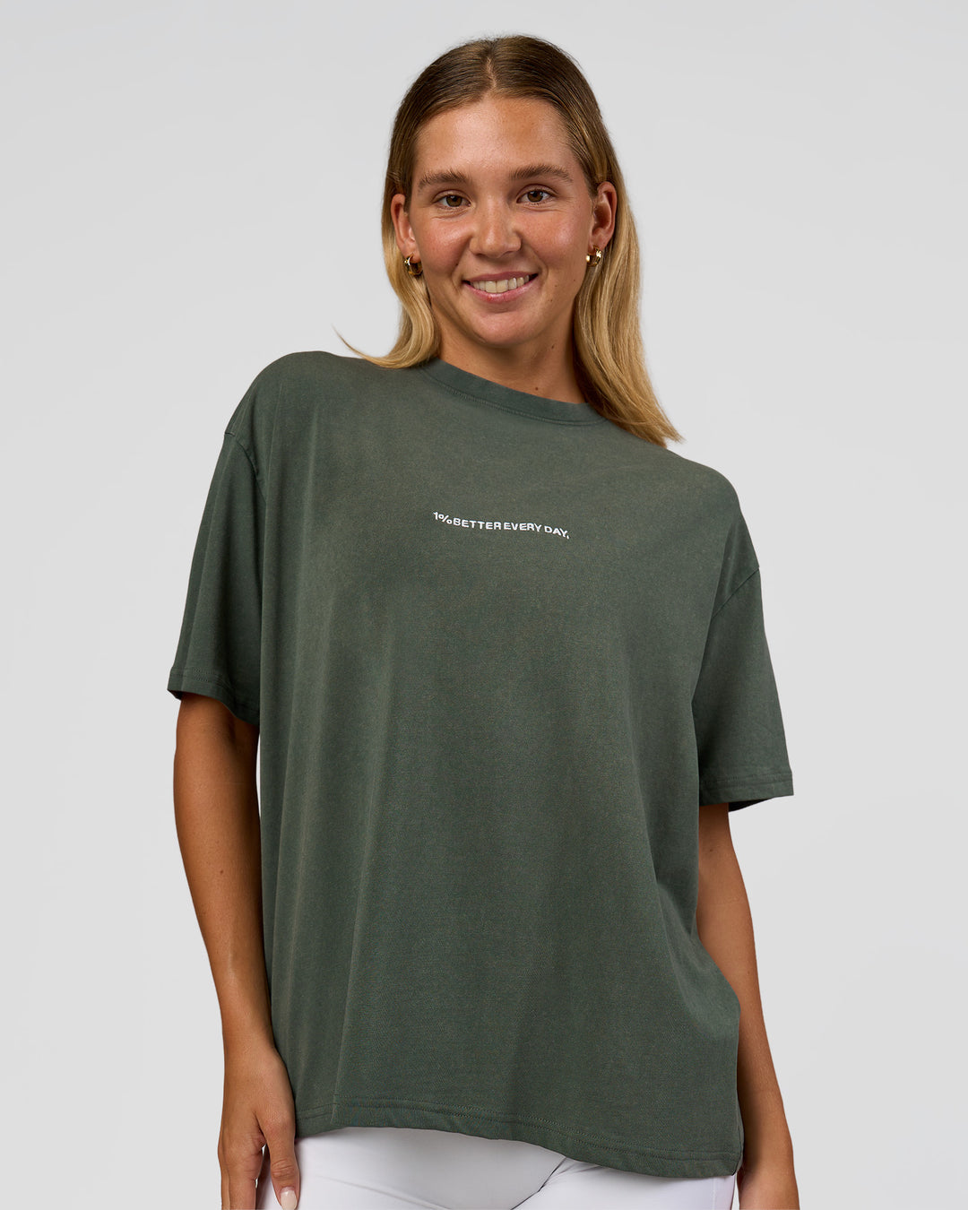 Woman wearing Go-To 1% Better Every Day FLXCotton Oversized Tee - Carbon Green Washed-White | Model:Amity | Size:XS