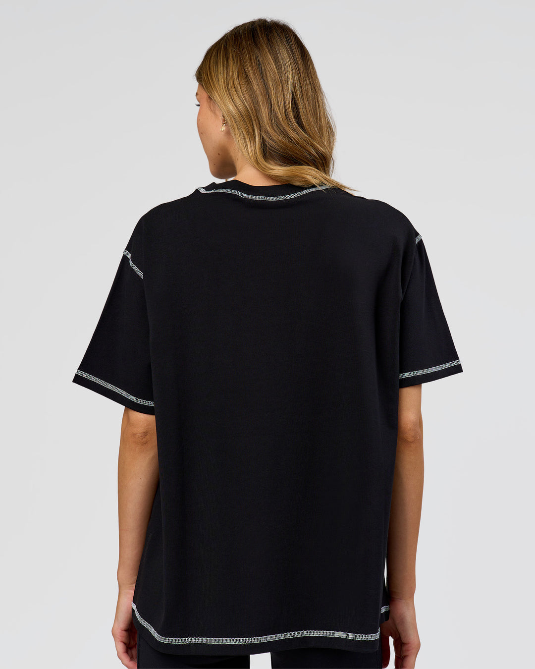 Woman wearing Go-To Contrast Oversized Heavyweight FLXCotton Tee - Black-White | Model:Leilani | Size:XS