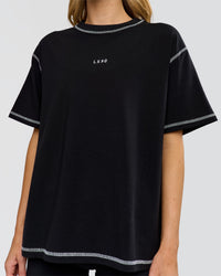 Woman wearing Go-To Contrast Oversized Heavyweight FLXCotton Tee - Black-White | Model:Leilani | Size:XS