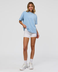 Woman wearing Go-To Contrast Oversized Heavyweight FLXCotton Tee - Open Air Washed-White | Model:Leilani | Size:XS