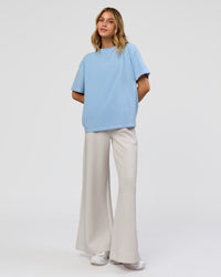 Woman wearing Go-To Contrast Oversized Heavyweight FLXCotton Tee - Open Air Washed-White | Model:Leilani | Size:XS