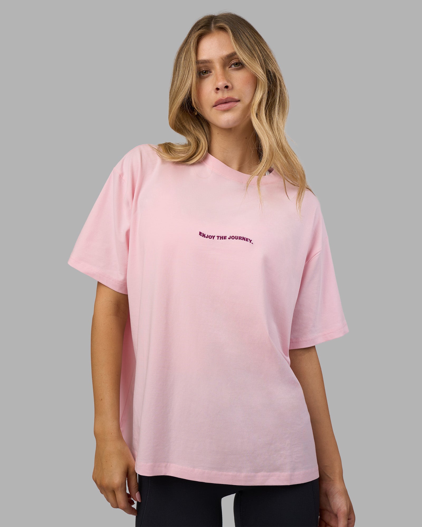 Woman wearing Go-To E.T.J FLXCotton Oversized Tee - Marshmallow-Plum Caspia | Model:Leilani | Size:XS