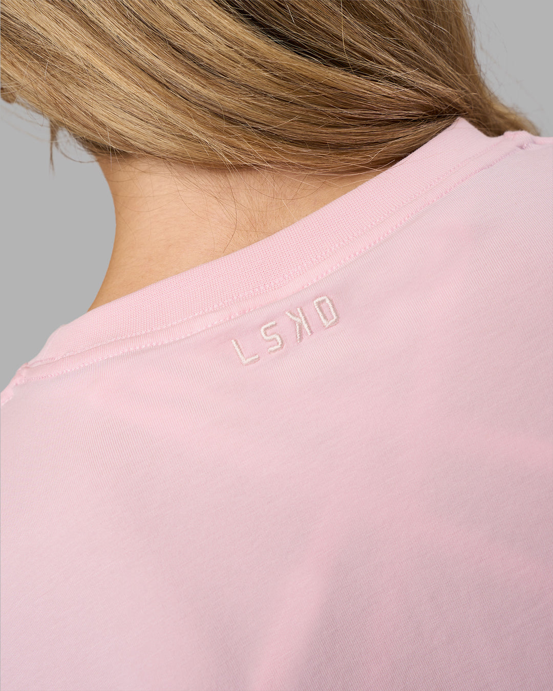 Woman wearing Go-To E.T.J FLXCotton Oversized Tee - Marshmallow-Plum Caspia | Model:Leilani | Size:XS