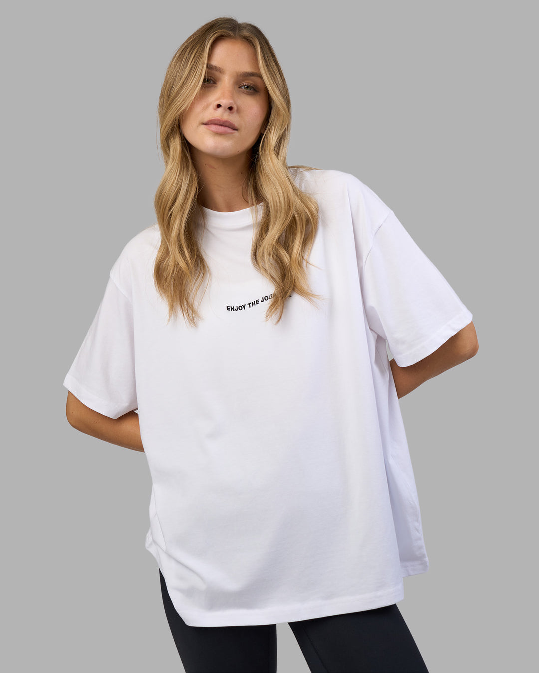 Woman wearing Go-To E.T.J FLXCotton Oversized Tee - White-Black | Model:Leilani | Size:XS