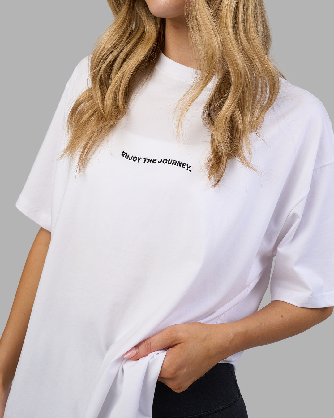 Woman wearing Go-To E.T.J FLXCotton Oversized Tee - White-Black | Model:Leilani | Size:XS