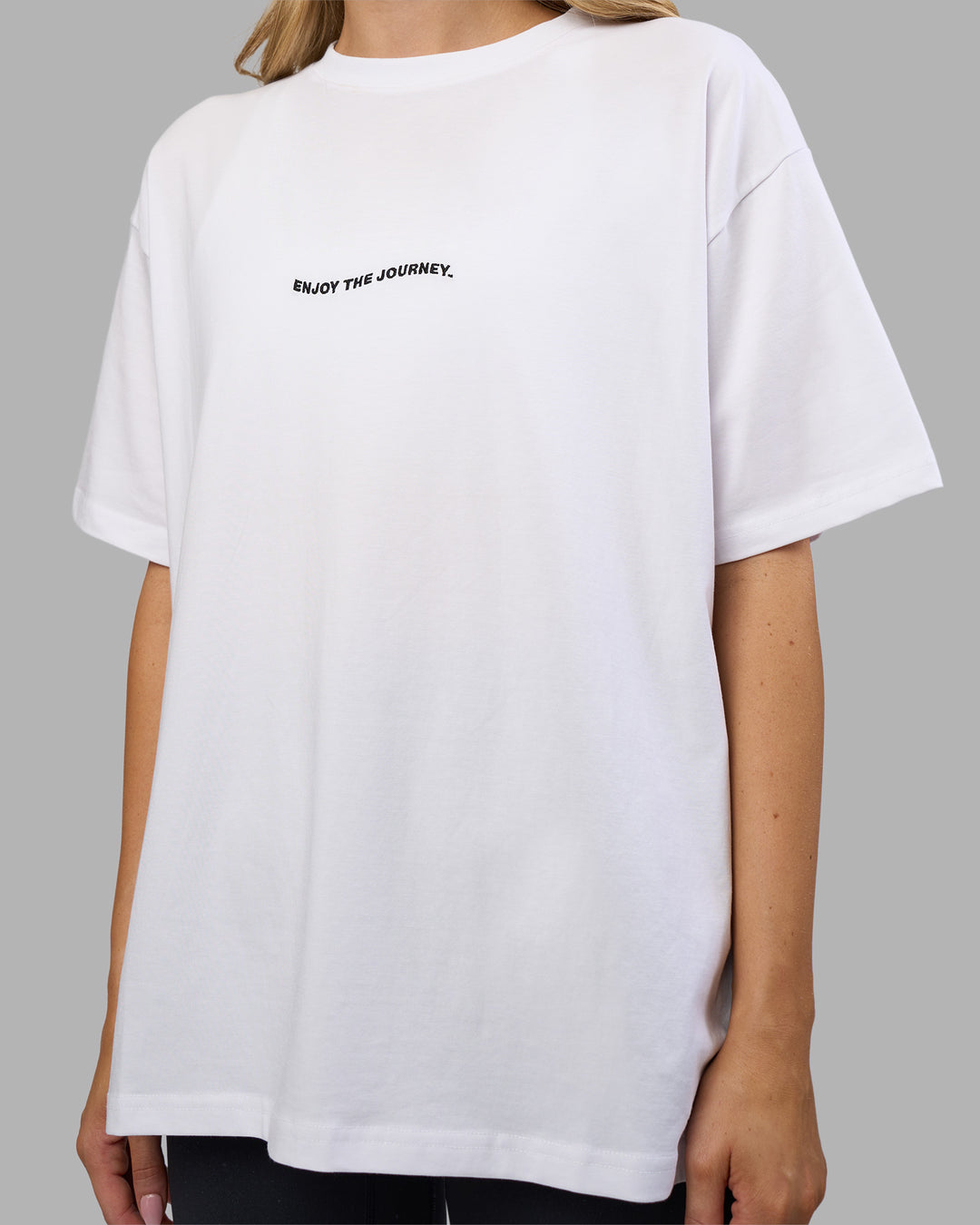 Woman wearing Go-To E.T.J FLXCotton Oversized Tee - White-Black | Model:Leilani | Size:XS