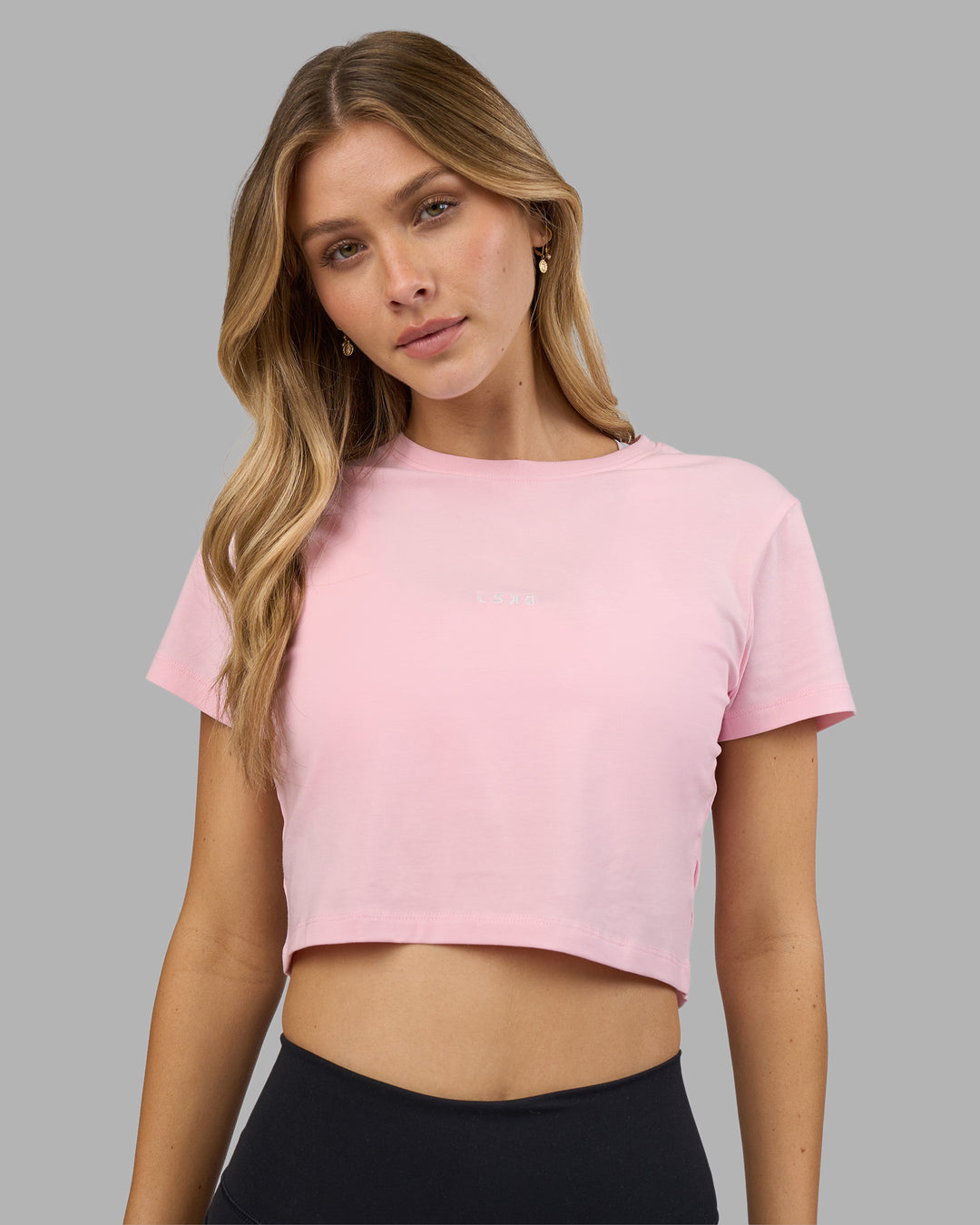 Woman wearing Go-To FLXCotton Baby Tee - Marshmallow-White | Model:Leilani | Size:XS