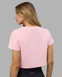Woman wearing Go-To FLXCotton Baby Tee - Marshmallow-White | Model:Leilani | Size:XS