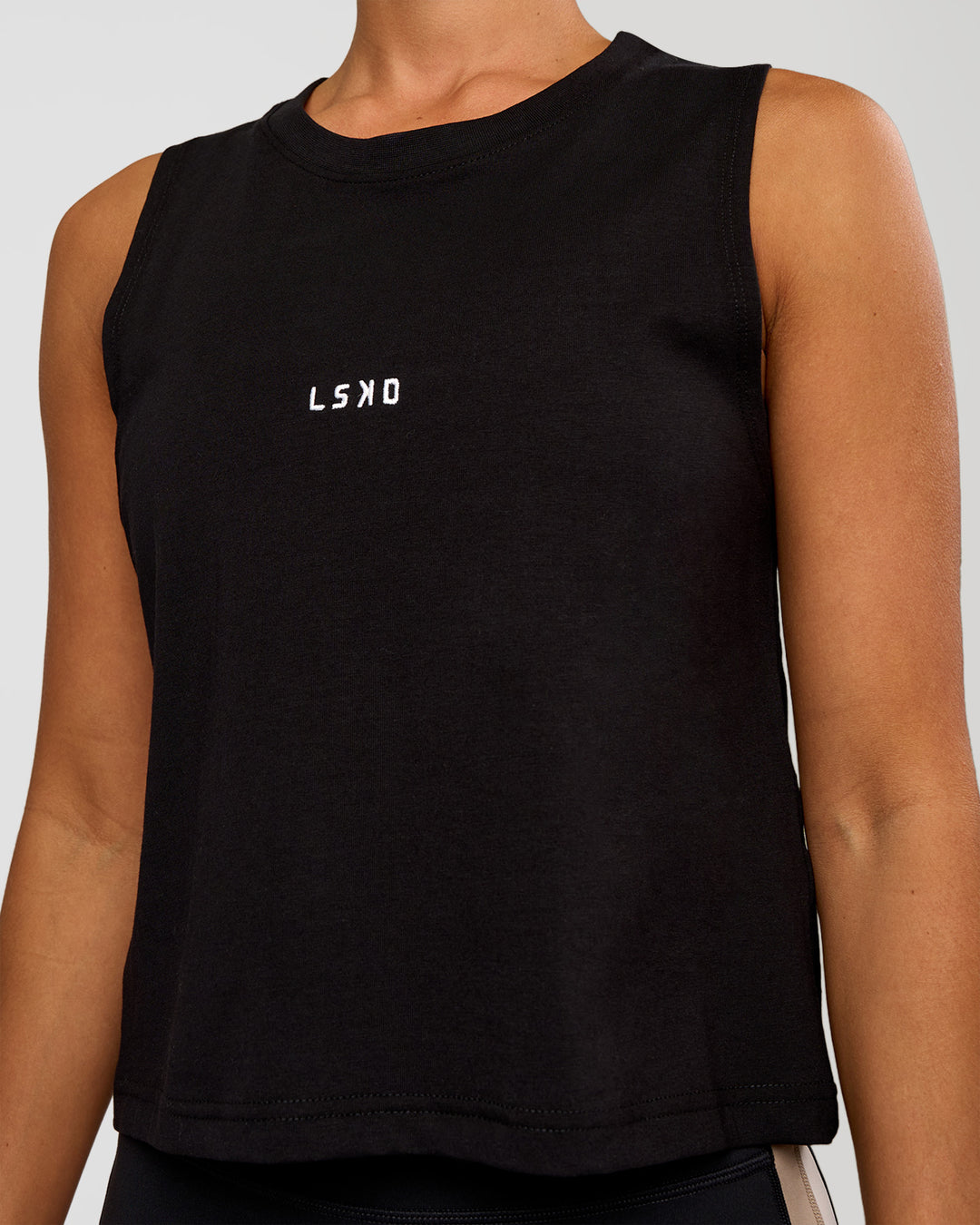 Woman wearing Go-To FLXCotton Midline Tank - Black-White | Model:Brylee | Size:XS