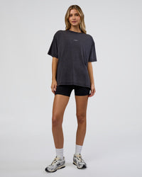 Woman wearing Go-To FLXCotton Oversized Tee - Black Washed-White | Model:Leilani | Size:S