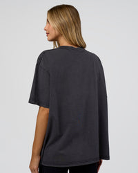 Woman wearing Go-To FLXCotton Oversized Tee - Black Washed-White | Model:Leilani | Size:S