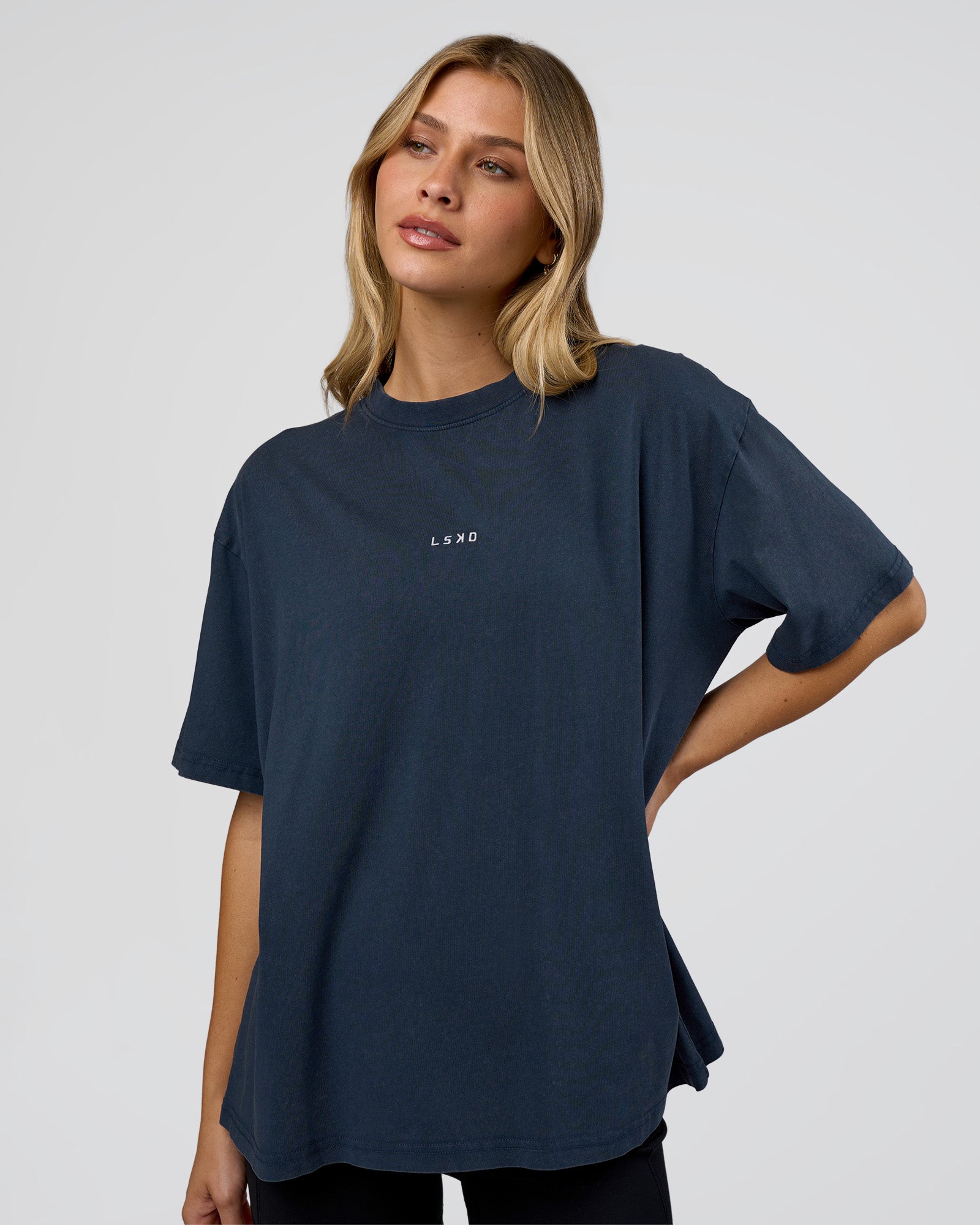 Woman wearing Go-To FLXCotton Oversized Tee - Future Navy Washed | Model:Leilani | Size:XS