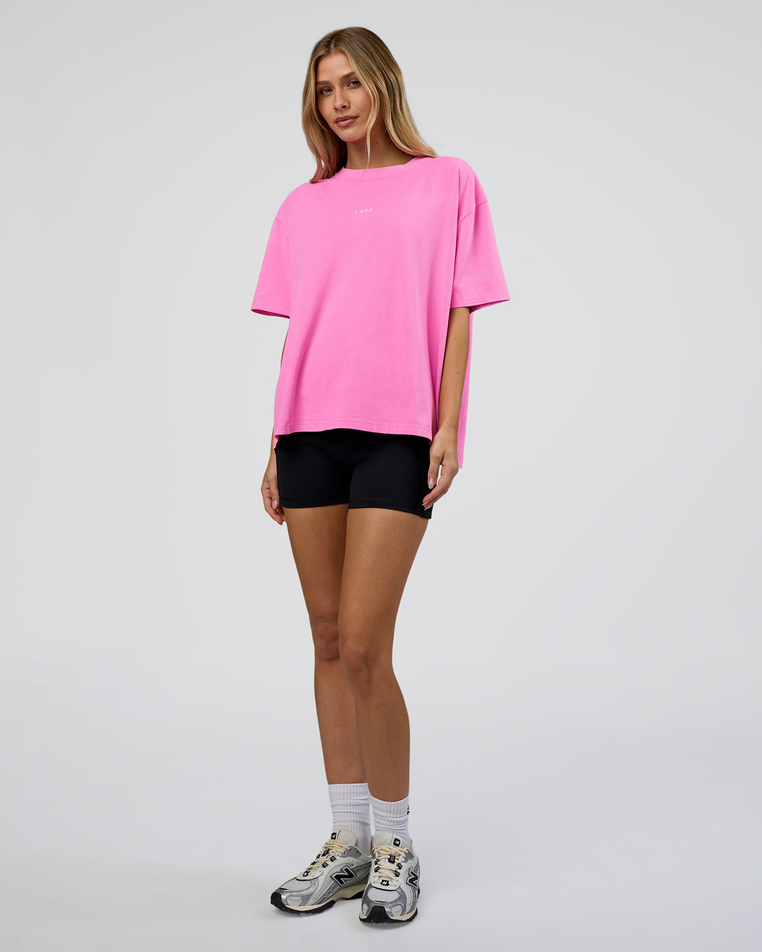 Woman wearing Go-To FLXCotton Oversized Tee - Ultra Fuchsia Washed | Model:Leilani | Size:XS