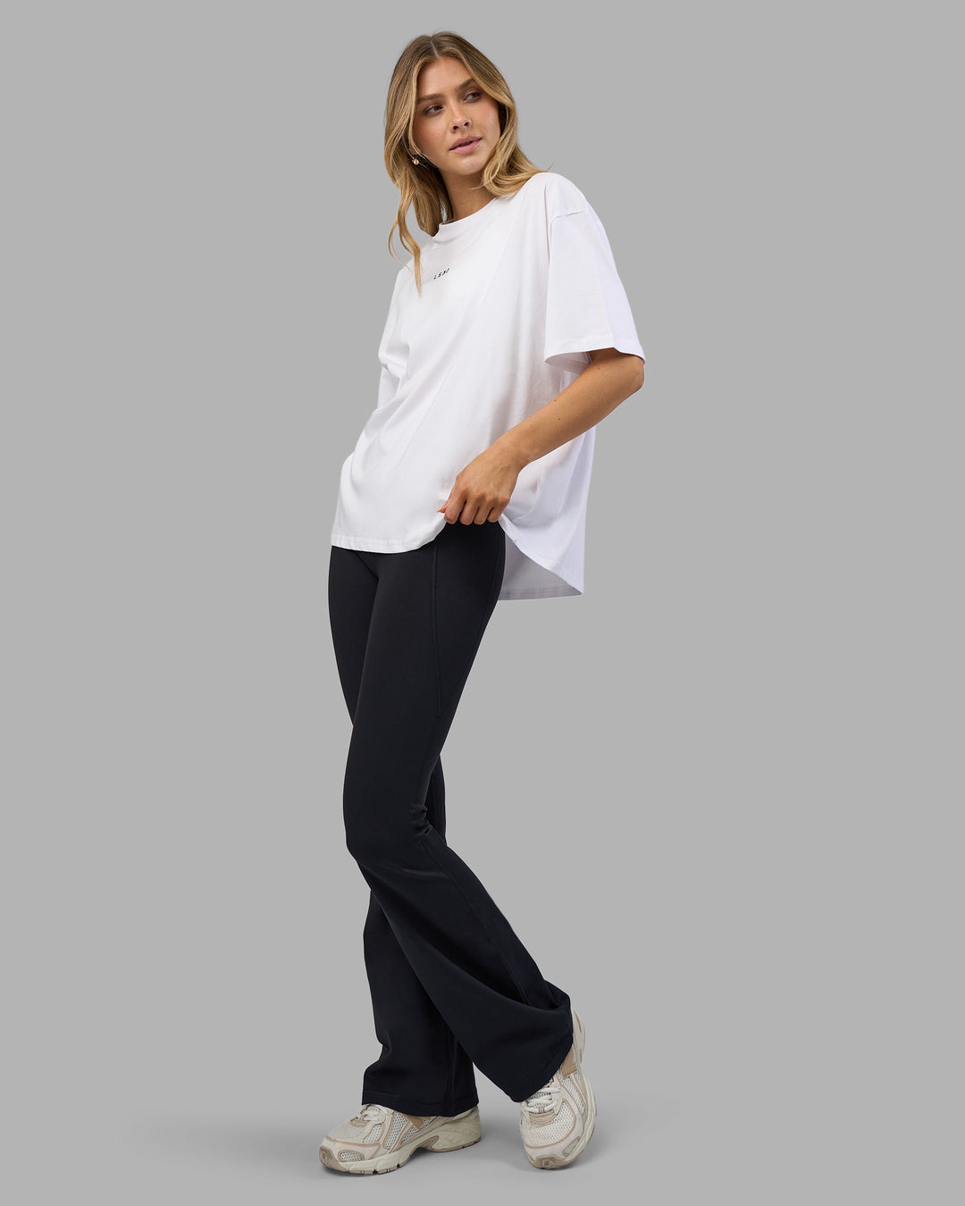 Woman wearing Go-To FLXCotton Oversized Tee - White-Black | Model:Leilani | Size:XS