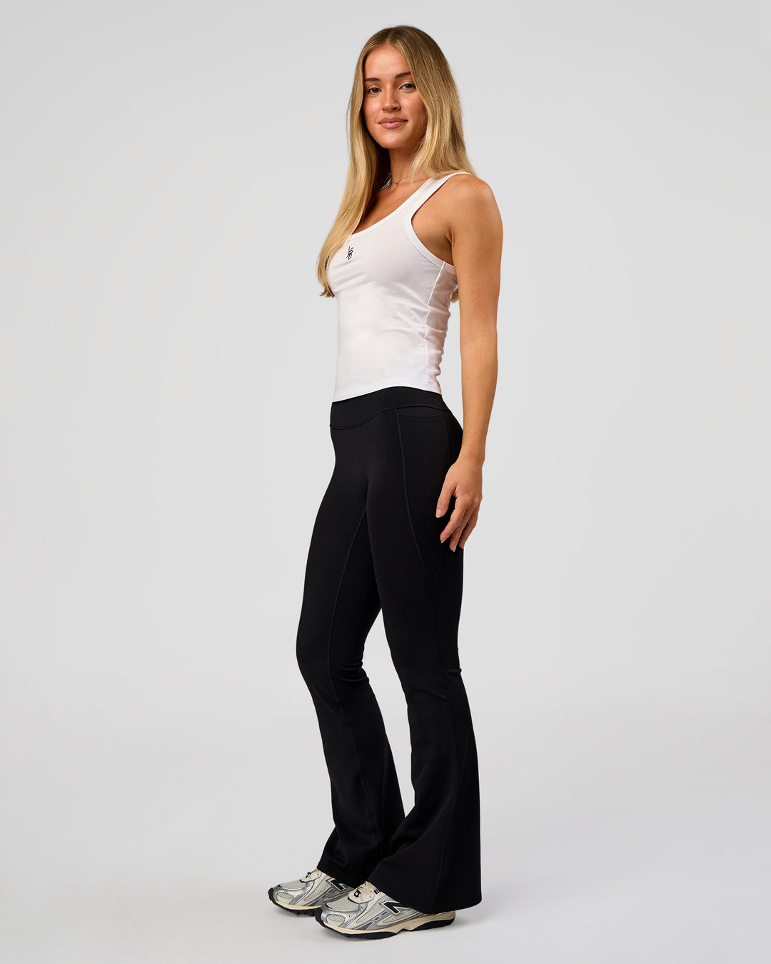 Woman wearing Go-To FLXCotton Scoop Neck Tank in White-Black | Model:Issy | Size:XS - view 10