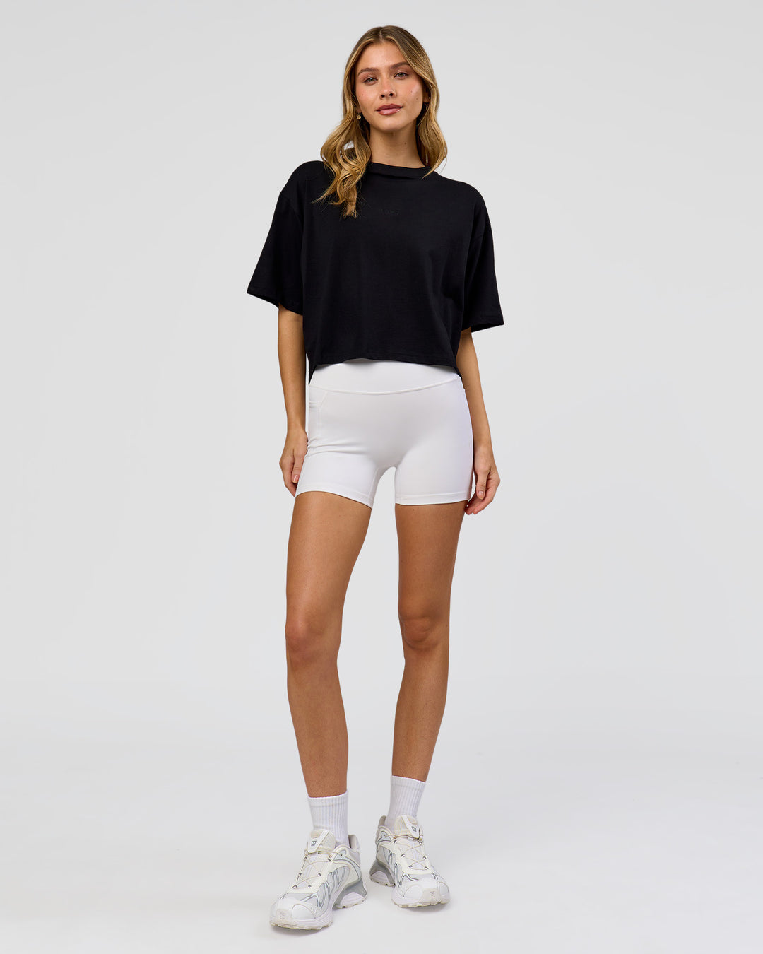 Woman wearing Go-To FLXCotton Skimmer Tee - Black-Black | Model:Leilani | Size:XS