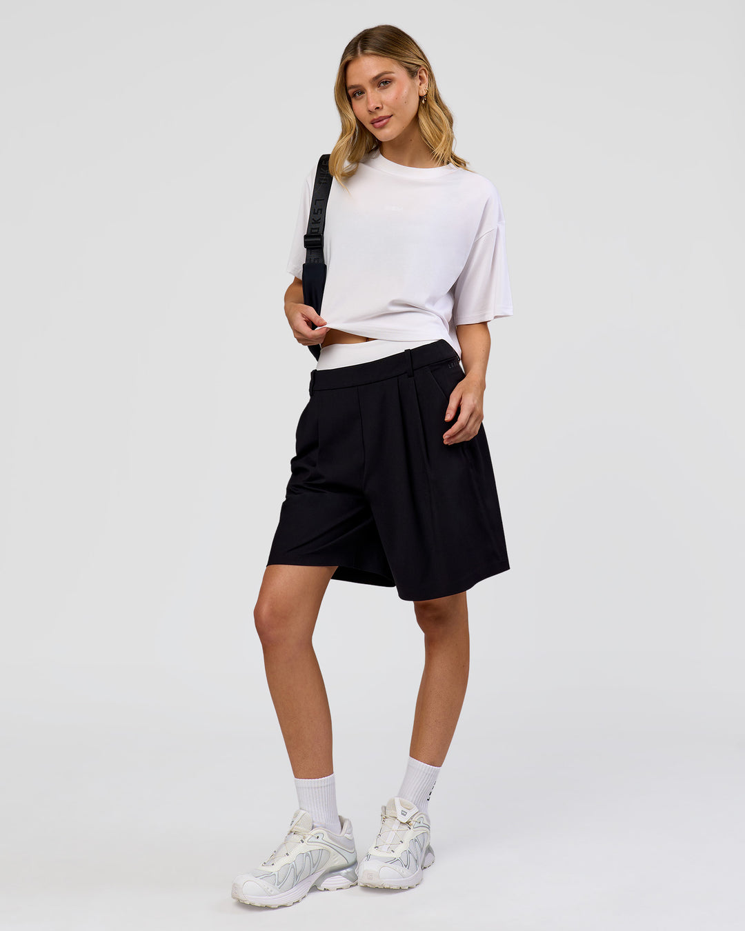 Woman wearing Go-To FLXCotton Skimmer Tee - White-White | Model:Leilani | Size:XS
